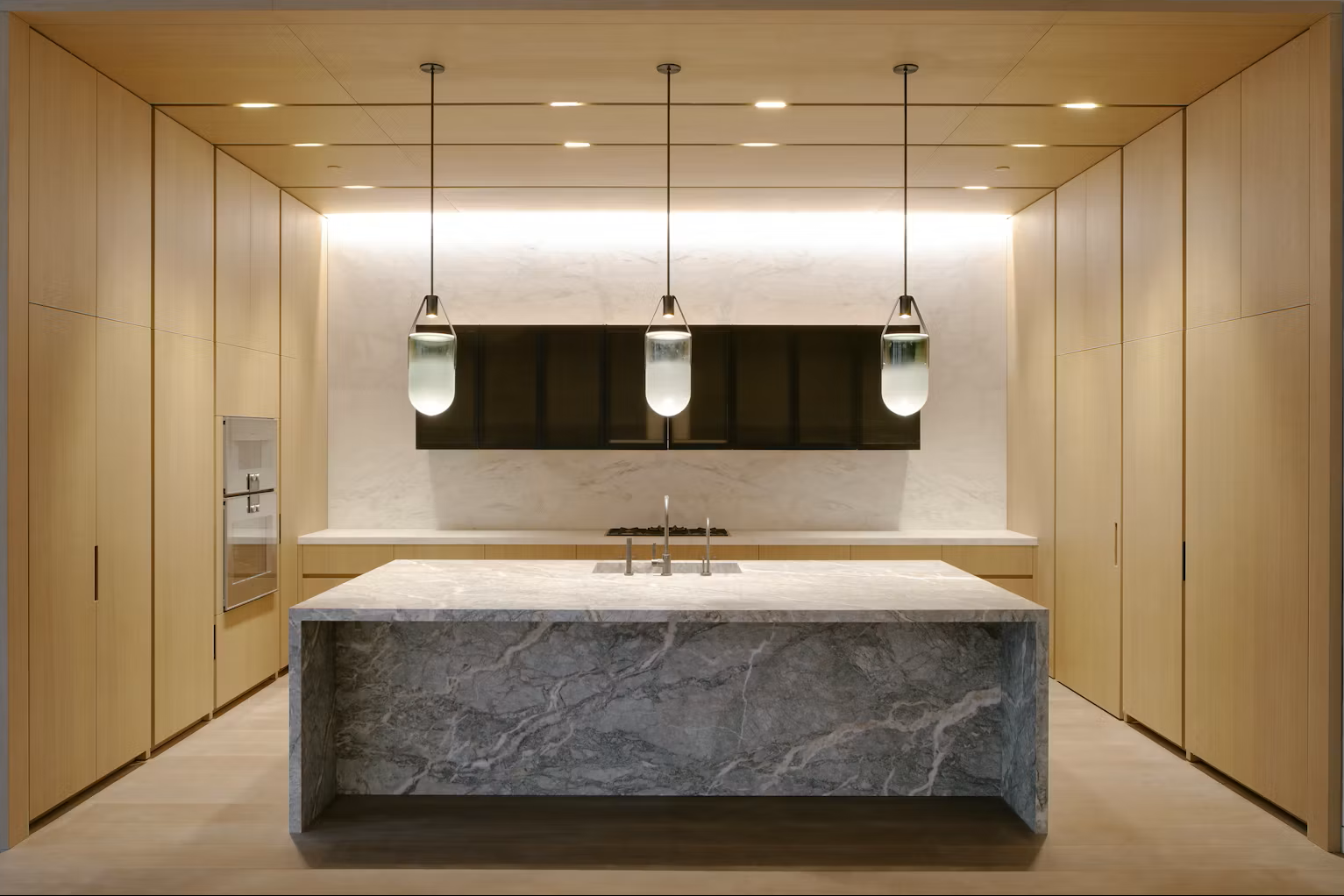 Custom kitchen cabinetry and stone island