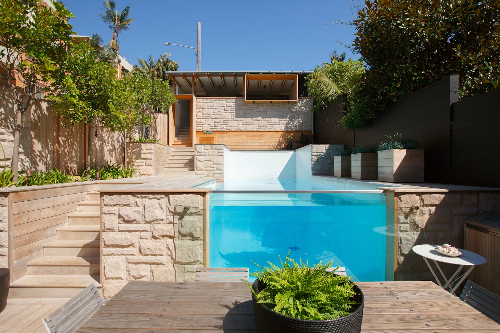 Renovated outdoor pool and stone terrace